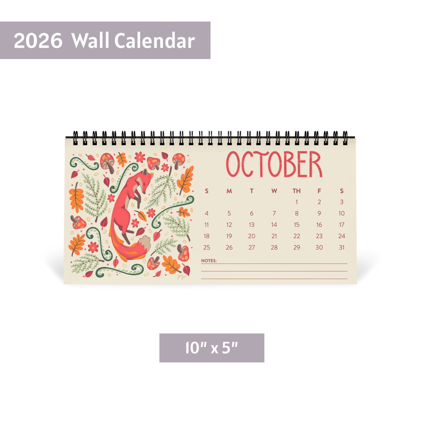 An image showing the size and dimensions of the 2026 illustrated desk calendar, measuring 10 inches by 5 inches (25.4 × 12.7 cm). The freestanding tent-card base and black spiral binding are clearly displayed to show scale and proportions. This photo helps buyers visualize how the compact calendar fits on a desk, shelf, or small workspace. Ideal for shoppers searching for a small 2026 desk calendar with colourful animal artwork.