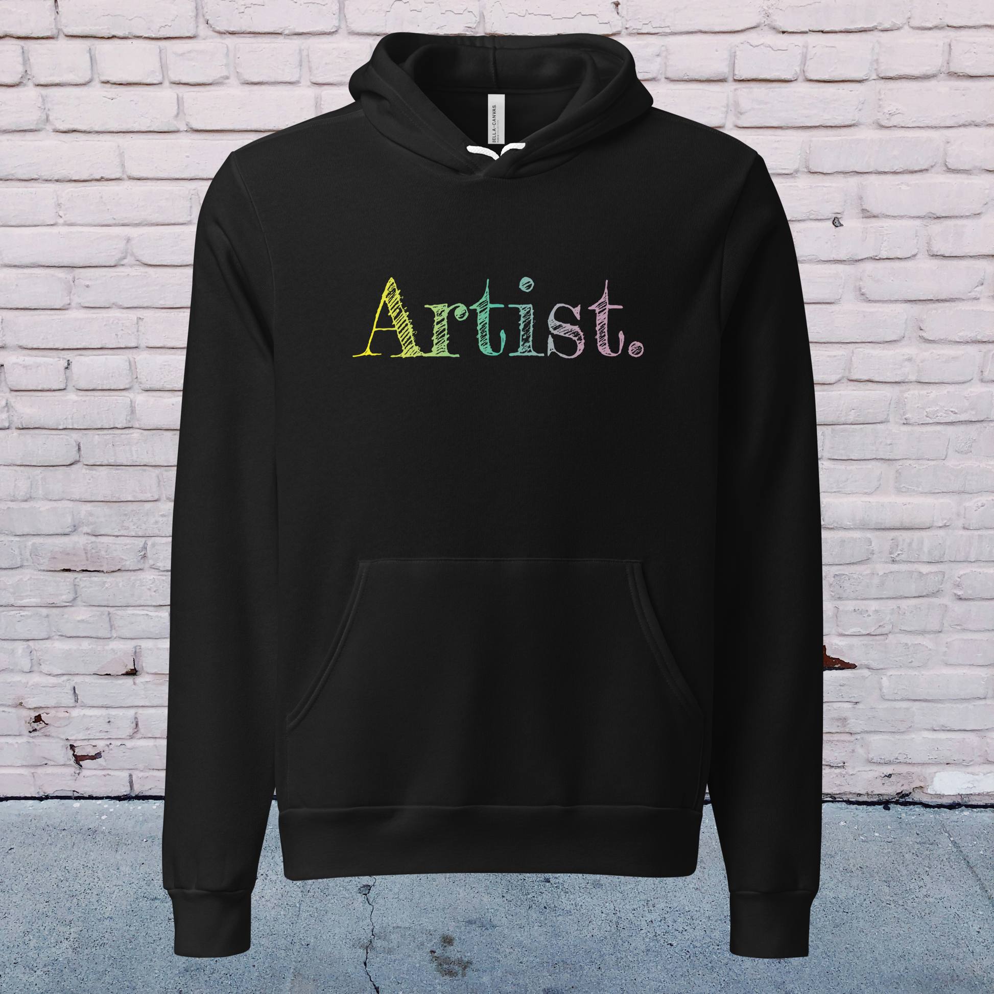 The black art hoodie is photographed on a ghost mannequin against a light lavender-purple background, highlighting the clean shape and unisex fit. The sketch-style gradient lettering in yellow, green and soft purple stands out against the black fabric, making it a stylish choice for artists, painters, designers and creatives. A cozy, aesthetic hoodie perfect for gifting or adding to an artistic wardrobe.